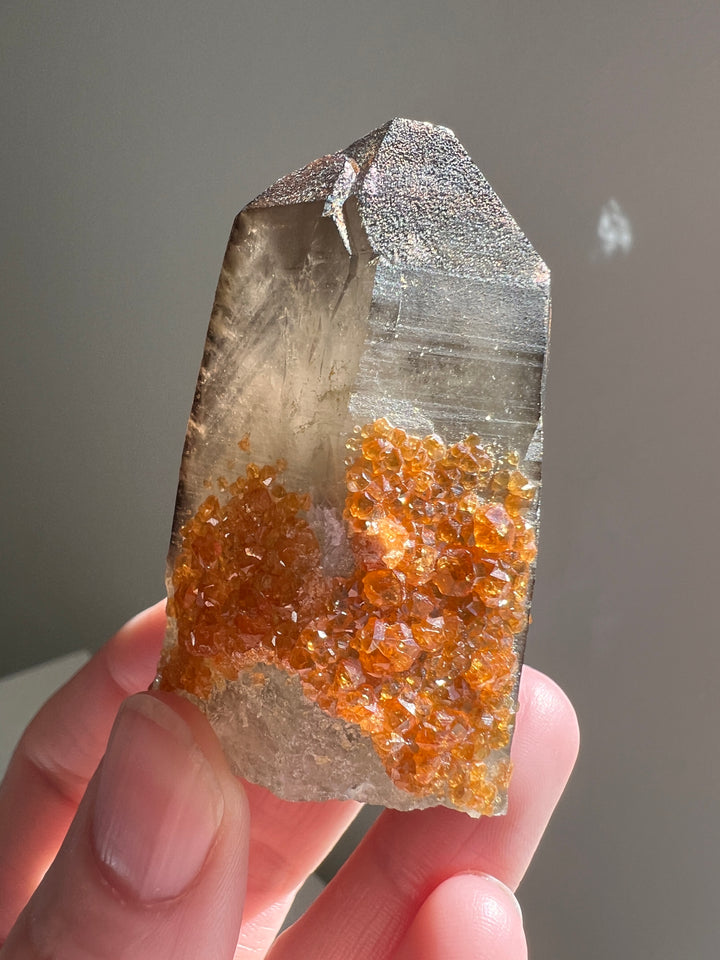 Spessartine Garent on Smoky Quartz | 108.4g