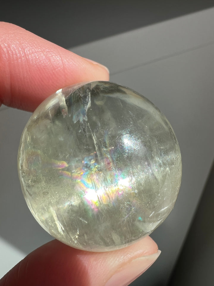 Hiddenite Sphere with Cat’s Eye & Rainbow Flash (Afghanistan) | 46.5g, 31mm